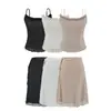 Conjunto de verano coreano casual de ajuste ceñido para mujer con top de tirantes de lunares negros y falda recta