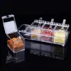 Suministros de cocina caja de condimentos transparente caja de condimentos de cuatro compartimentos tarro de condimentos cuatro en uno con cuchara juego suministro directo de fábrica