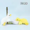 Muñeco de agarre de cuatro pulgadas muñeca pequeña llavero de peluche lindo colgante para mochila juguete de peluche regalo muñeca al por mayor