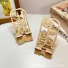 Ornatos de Mesa de Abóbora de Halloween Criativos Transfronteiriços Suporte de Exibição de Celular Oco de Madeira Suportes Preguiçosos Ornatos