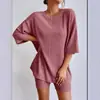 Europeu e Americano Transfronteiriço Novo 2024 Moda Tricô Casual Cor Sólida Verão Gola Redonda Solto Feminino Conjunto de Shorts e Top