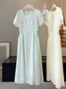 Vestido Longo Feminino Verão Novo Estilo Quadrado Francês Franzido na Cintura Senso de Design Emagrecedor Pausa para o Chá Estilo Suave Temperamento