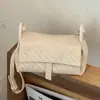 Bolsas de Nicho Super Quentes para Mulheres Verão 2026 Nova Moda Versátil Bolsa Transversal Exquisita Mini Bolsa para Celular Bolsa Quadrada Pequena