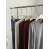 Camiseta de manga larga adelgazante de otoño con diseño de costuras visibles, top versátil adelgazante para mujer de primavera y otoño con hombros normales y alta elasticidad