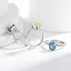 Transmisión en Vivo Venta Caliente Anillo Huevo de Paloma Retorcido Corte Flor de Hielo Piedra Preciosa de Color Incrustado con Diamante de Alto Carbono Brillante Joyería Envío Directo