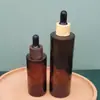 Botellas gotero marrones a prueba de luz al por mayor para cuidado de la piel, esencia corporal, aceites esenciales, perfumes, cosméticos, botellas de muestra de prueba