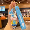 Liquidación de colección de llaveros colgantes de personajes de dibujos animados IP auténticos, lindos colgantes de estrella-luna-conejo para bolsos de niñas, stock para vendedores ambulantes