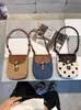 Bolso de teléfono de lunares de venta caliente transfronterizo, nuevo bolso de hombro cruzado simple de moda de verano 2026, versátil y de alta gama