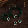 Collar y pulsera de perlas de imitación con flor de diamante francés, cadena de clavícula de nicho de moda, joyería de alta gama que combina con todo.