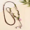 Collar con colgante de campana de mariposa de cerámica de estilo étnico retro para mujer, diseño nuevo y moderno, cadena larga para suéter, accesorios