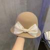 Otoño e Invierno nuevo estilo que hace que la cara se vea pequeña sombrero de lana tipo cubeta para mujer estilo retro Hepburn sombrero de copa con lazo elegante sombrero de pescador de lana