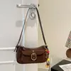 Bolso de axila para mujer 2026 nuevo de moda de verano popular de nicho bolso de hombro con un toque de alta gama, versátil para ir al trabajo, bolso cruzado