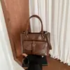Bolso Retro Transfronterizo para Mujer 2026 Nuevo Otoño Invierno Gran Capacidad Hombro Único Cruzado Bolso Cubo Sencillo Casual
