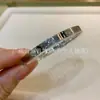 Pulseira de amor CNC alta qualidade estreita média larga novo estilo grossa banhada a ouro rosa 18K pulseira de pulso para casal transfronteiriça