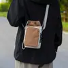 Bolsas de lona no atacado para mulheres, nova moda de verão 2026, design de nicho, bolsa de ombro transversal, estilo coreano, bolsa popular para celular