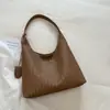 2026 Verano Nuevo Bolso de Hombro Único con Textura Tejida Moda para el Trabajo Bolso de Axila Bolso Tote Simple Bolso de Mano de Alto Valor