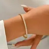 Pulseira de Moda Bicolor Ouro e Aço com Zircônias Cúbicas, Joia Versátil de Aço Inoxidável Simples e Única para Mulheres
