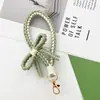 Colgante de Moño Tejido Hecho a Mano Transfronterizo, Cadena para Bolsos y Teléfonos Color Caramelo Estilo Ins, Correa para Teléfono