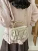 Bolso tipo caja de bola dorada pequeña con cadena plisada estilo Chanel modelo nuevo 2026 bolso de hombro para maquillaje bordado bolso cruzado