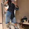 Nuevos shorts de estilo americano para verano para hombres y mujeres, marca de moda, diseño fino, nicho, corte holgado, talla grande, shorts deportivos casuales hasta la rodilla