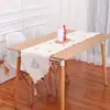 Camino de mesa transfronterizo de Amazon con motivo de anciano sin rostro, camino de mesa bordado estilo europeo, decoraciones navideñas, productos sobrantes de comercio exterior