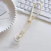 Cordão de Celular com Trava Ajustável, Corda de Mão, Pingente, Pulseira de Pulso, Corrente, Corda com Pingente Fixo, Estilo Curto para Homens e Mulheres, Anti-Perda e Anti-Queda