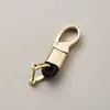 Llavero de cuerda trenzada de fábrica, accesorios de ferretería, hebilla de herradura, colgante para llave de coche, accesorios de moda para coche