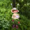Muñeca de sonajero de cáscara de fruta natural producto terminado rana de ojos grandes colgante DIY terapia de sonido accesorio de decoración cultural y creativo para bolsos y coches