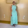 Ropa de mujer transfronteriza europea y americana otoño 2026 nuevo sexy y elegante color liso plisado ajustado sin mangas vestido largo