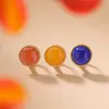 Pendientes de Clip para Oreja Redondos Estilo Vintage de Alta Gama de Plata de Ley S925 con Cera de Abeja Roja Agua y Lapislázuli de Yuebao Jewelry