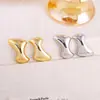 Pendientes Irregulares Geométricos de Moda Europea y Americana con Galvanoplastia de Oro Real Pendientes de Lujo Ligero de Nicho Pendientes de Venta Caliente Transfronteriza
