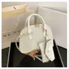 Bolso de textura de moda para mujer 2024 nuevo estilo extranjero moda personalidad patrón de cocodrilo bolso de hombro cruzado bolso tipo concha