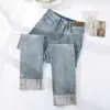 Calça Jeans de Fumaça Enrolada Feminina Nova Primavera e Outono 2025 Cintura Alta Cor Clara Reta Calça French Stick para Homens Baixos