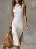 2026 Novo Vestido Regata Feminino de Moda Estilo Europeu e Americano, Cor Sólida, Sem Mangas, com Fenda Alta, Elegante Vestido de Tricô de Comprimento Médio