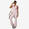 Bestseller transfronteiriço: Macacão esportivo fitness justo, de secagem rápida, com lindo design nas costas, macacão de yoga levemente flare, peça única de renda com decote V