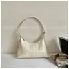 Bolso de axila de estilo francés de alta gama transfronterizo, nuevo y moderno y elegante bolso HOBO, bolso de hombro versátil, venta al por mayor