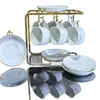Conjunto de Xícara e Pires para Café Estilo Coreano Transfronteiriço Xícara de Café Branca Pura Xícara de Cerâmica Conjunto de Xícara e Pires para Café para Home Office Venda por Atacado
