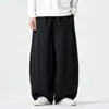 Calça jeans masculina estilo japonês retrô, modelagem solta, perna larga e reta, calça de trabalho americana oversized, lavada e com aspecto desgastado