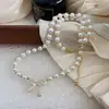 Collar de Perlas de Vidrio con Lazo Dorado, Cadena Fina para el Cuello Femenina y Elegante, Nueva Cadena Popular para la Clavícula 2026