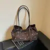 Bolsa de Ombro Grande Capacidade com Bolinhas Texturizadas Estilo Ocidental Moda Nova Outono 2026 Simples Versátil Alto Valor