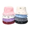 Sombrero de cuenca nuevo transfronterizo para mujer otoño e invierno europeo y americano casual sombrero cálido bordado de mariposa de lana de cordero sombrero de pescador comercio exterior para mujer