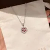 Collar estilo transmisión en vivo de TikTok con flor de cinco pétalos de diamante naranja rojizo brillante, cadena para la clavícula de mujer de lujo ligero, exquisita, de alta gama