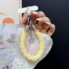 Pulseira de celular colorida e estilosa, cordão de pulso, alça de mão curta multifuncional, pingente de chaveiro, nova pulseira de celular