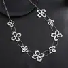 Colgante Largo Geométrico de Flor Hueca Esmaltada de Venta Caliente Transfronteriza Colgante de Collar Todo Fósforo de Corazón de Alta Calidad para Mujer
