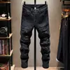 Jeans negros de alta gama rotos para hombre, marca de moda, patchwork desgastado, nuevo estilo otoño/invierno 2022, ajustados elásticos
