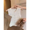 Chaleco de punto de encaje hueco color blanco roto para mujer, estilo coreano de verano, fino, casual, versátil, top sin mangas