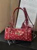 Bolsa de Mão/Ombro para Mulheres Design de Nicho Personalidade da Moda 2026 Novo Estilo Bolsa de Ombro de Alta Qualidade Versátil Bolsa Baguette Tendência