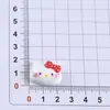 Manzana KT gato caricatura nuevo DIY pegamento de crema funda de teléfono pasador para el pelo cuerda para el pelo joyería accesorios de resina venta al por mayor