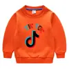 Suéter cruzado para niños otoño e invierno 2020 estilo occidental nuevo TikTok con forro de terciopelo abrigo de invierno cálido