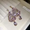 Pendientes de plata de aguja transfronterizos europeos y americanos con colgantes de gota de agua en forma de rombo incrustados de diamantes, pendientes de diseño exagerado, pendientes de sensación de lujo ligero y alta gama